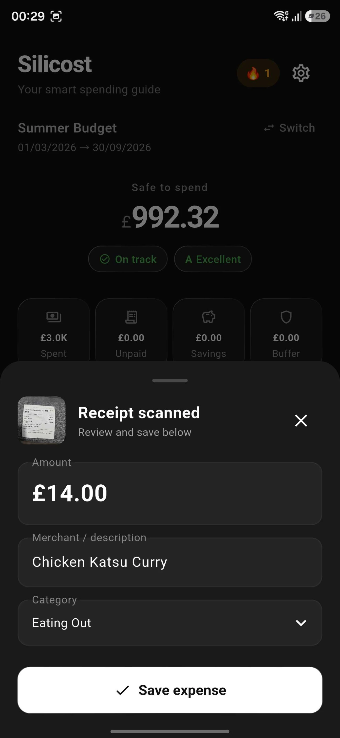 Receipt scanned modal auto-extracting amount, merchant, and category from a photo