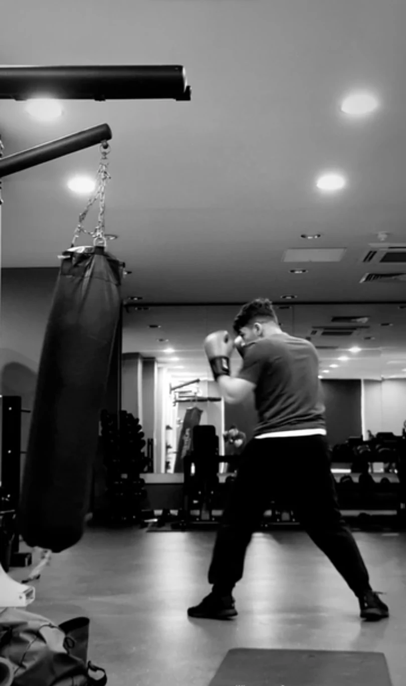 Training on a punching bag at the gym